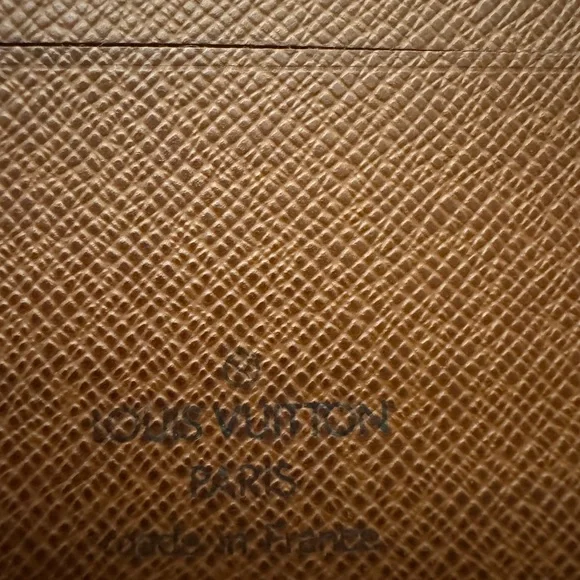 Louis Vuitton men’s multiple monogram wallet.